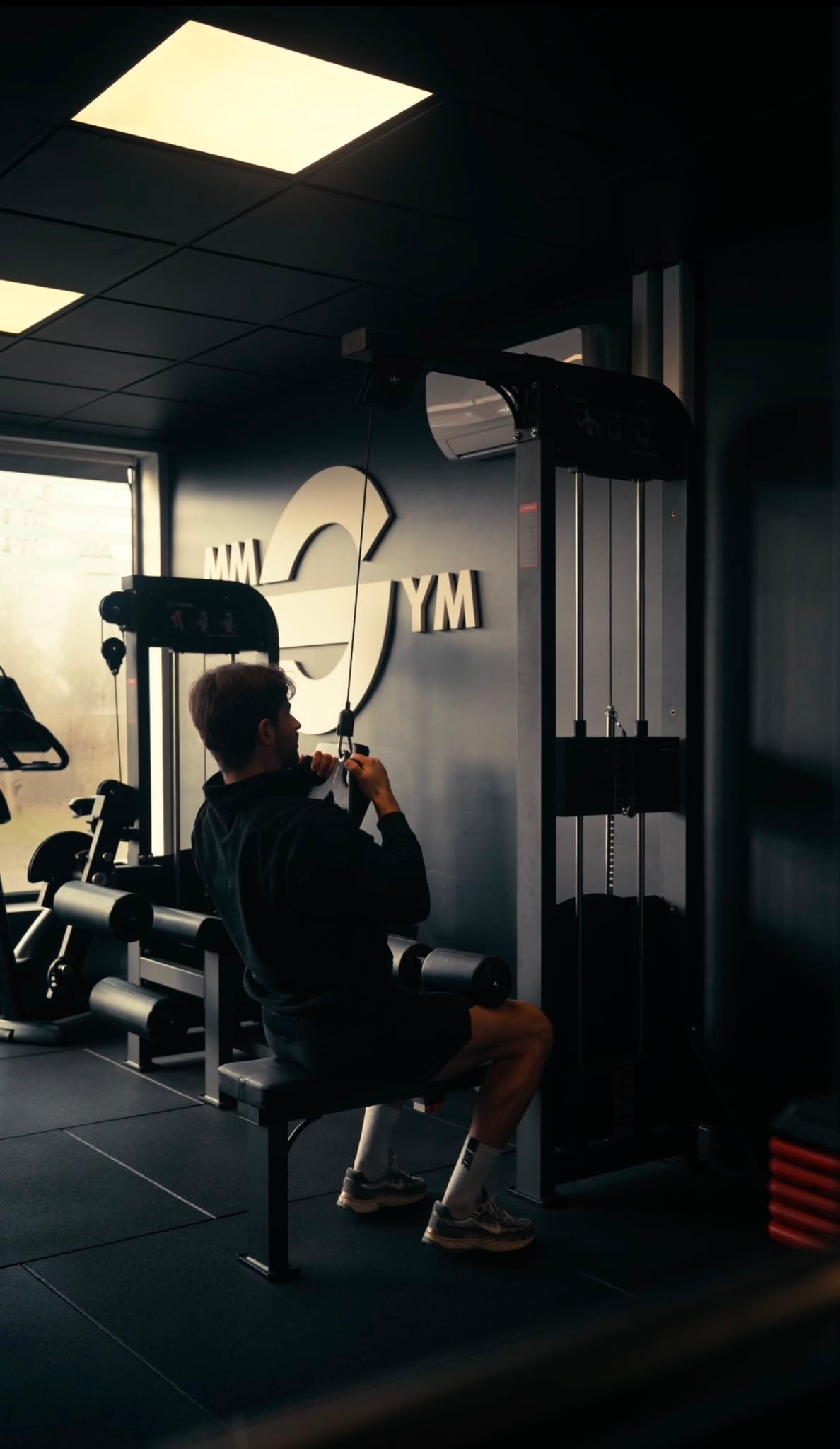 Poste de poulie face au mur MyMicroGym